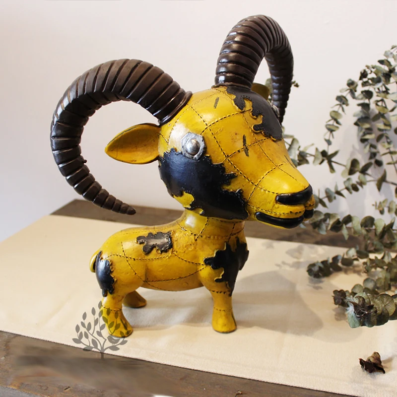 

CREATIVE YELLOW AFRICAN ANIMAL ART STATUE ORNAMENTS UNIQUE NORDIC MAP SURFACE ANTELOPE AND CATTLE FINE RESIN SCULPTURE