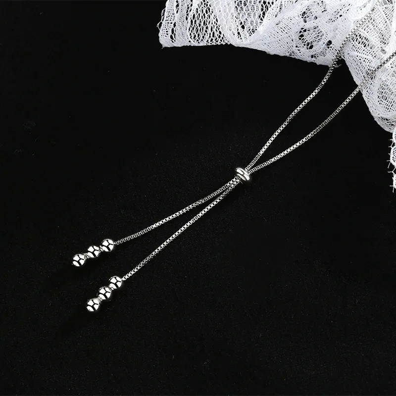 Цепочка женская из серебра 925 пробы с кисточками и змеиной костью | Украшения