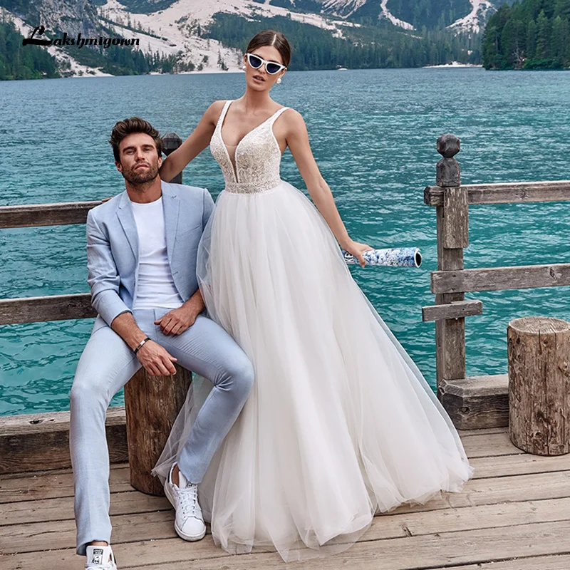 

Lakshmigown Boho Wedding Dresses Deep V-neck Spaghetti Straps Tulle A line Bohemia Beach Bridal Gown Backless Vestidos de Novia