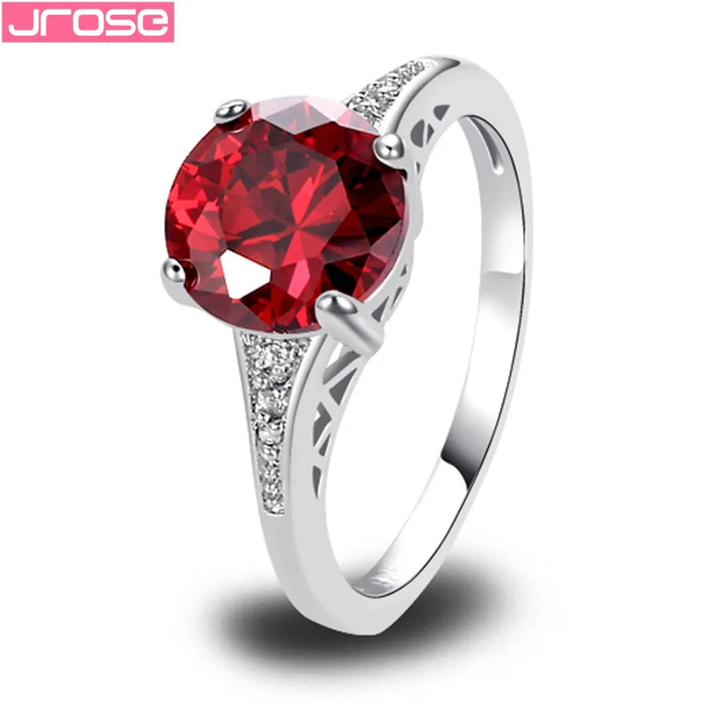 Женское свадебное кольцо с фианитом JROSE розовое разноцветное Красное золото