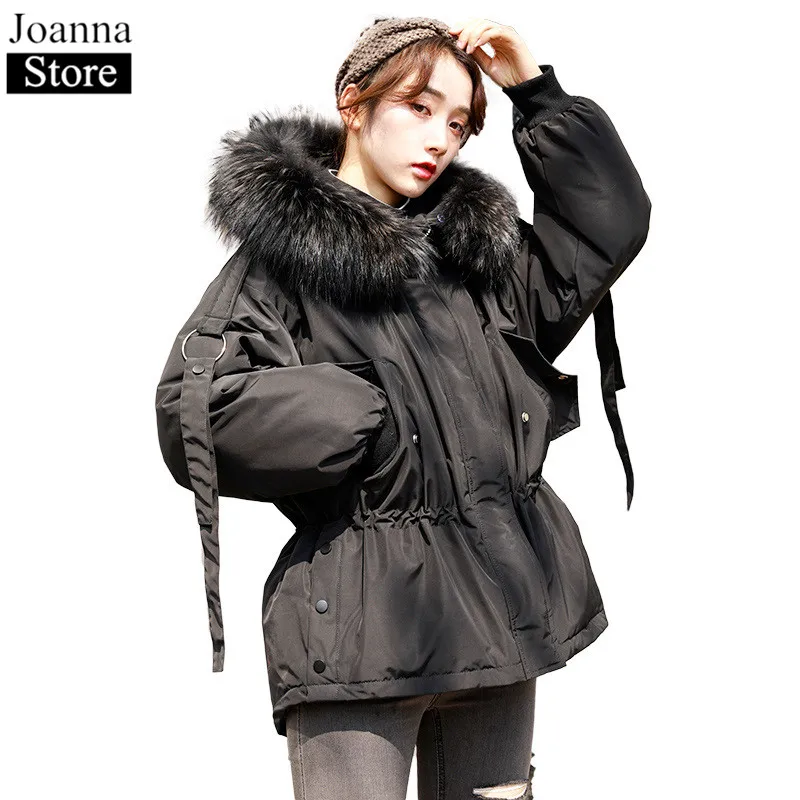 Женский пуховик на белом утином пуху с воротником из натурального меха рукавом