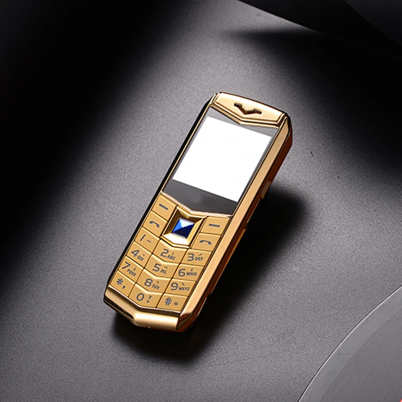 Мини Роскошный металлический корпус телефона с MP3 камерой Bluetooth фонарик детский телефон 1,5 ''мобильные телефоны