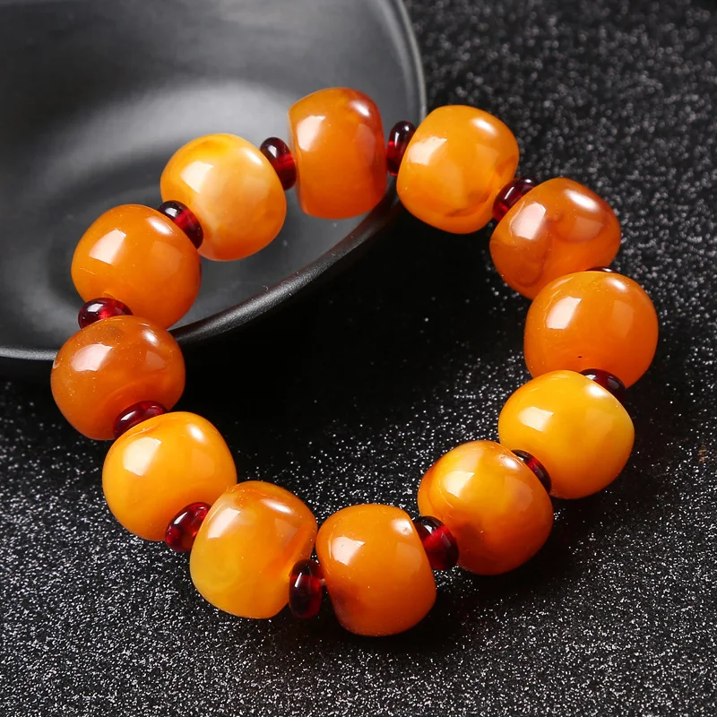 

Женский и мужской браслет-ведро с красным жемчугом