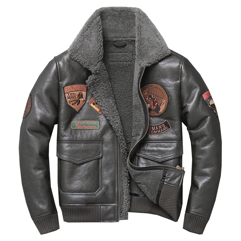 Мужская куртка из натуральной кожи зимняя теплая армейского зеленого цвета с