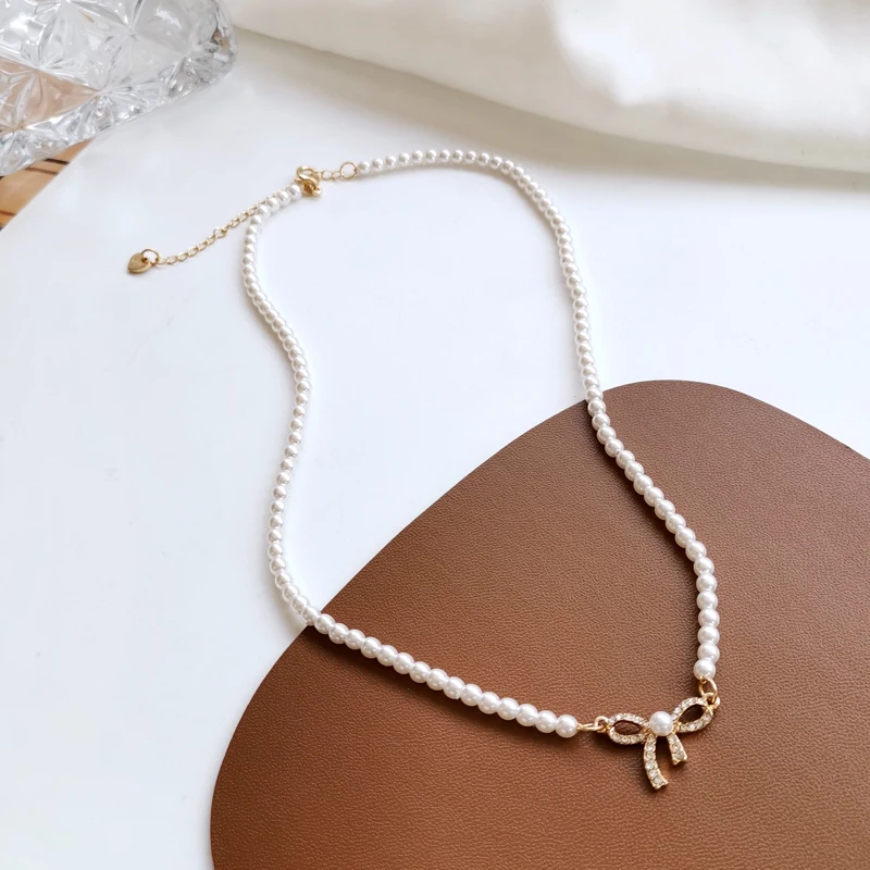 

Delicate Jewelry Bow Pendant Necklace Popular Design Sweet Temperament Simulated Pearl Choker Necklace For Girl Fine Accessories