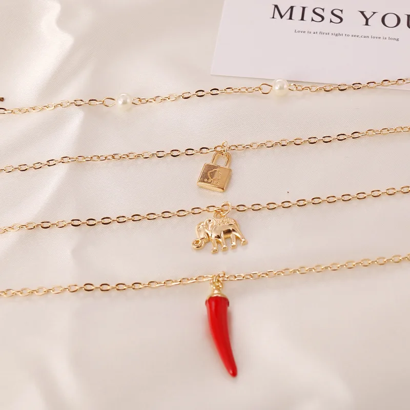 Винтажное многослойное жемчужное ожерелье с красным перцем и замком в виде слона