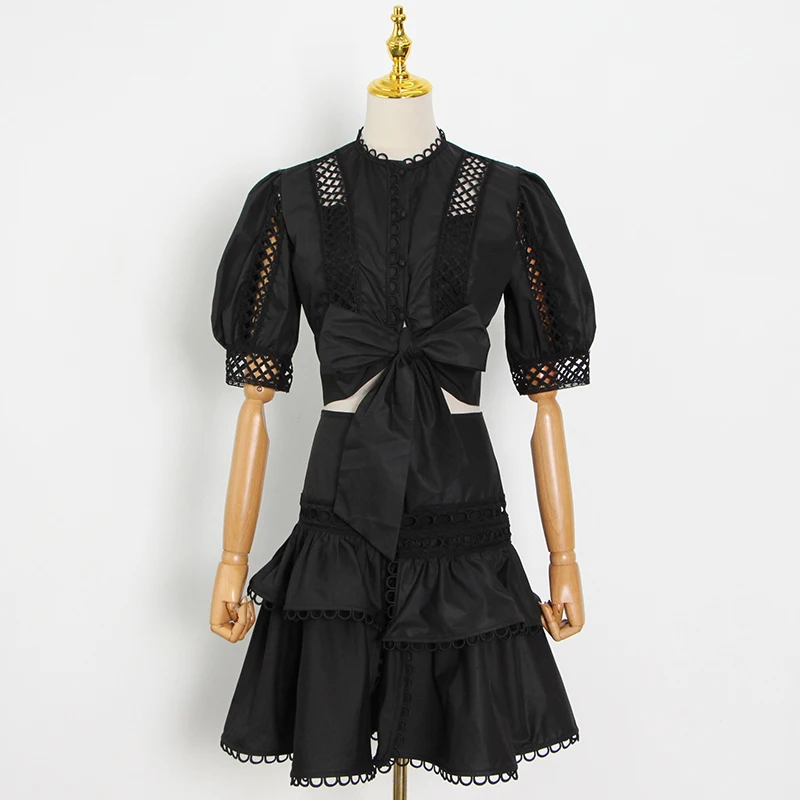 

TWOTWINSTYLE Hollow Out Black Set For Women Stand Collar Puff Sleeve Tops High Waist Mini Skirt Patchwork Bowknot Sets Female