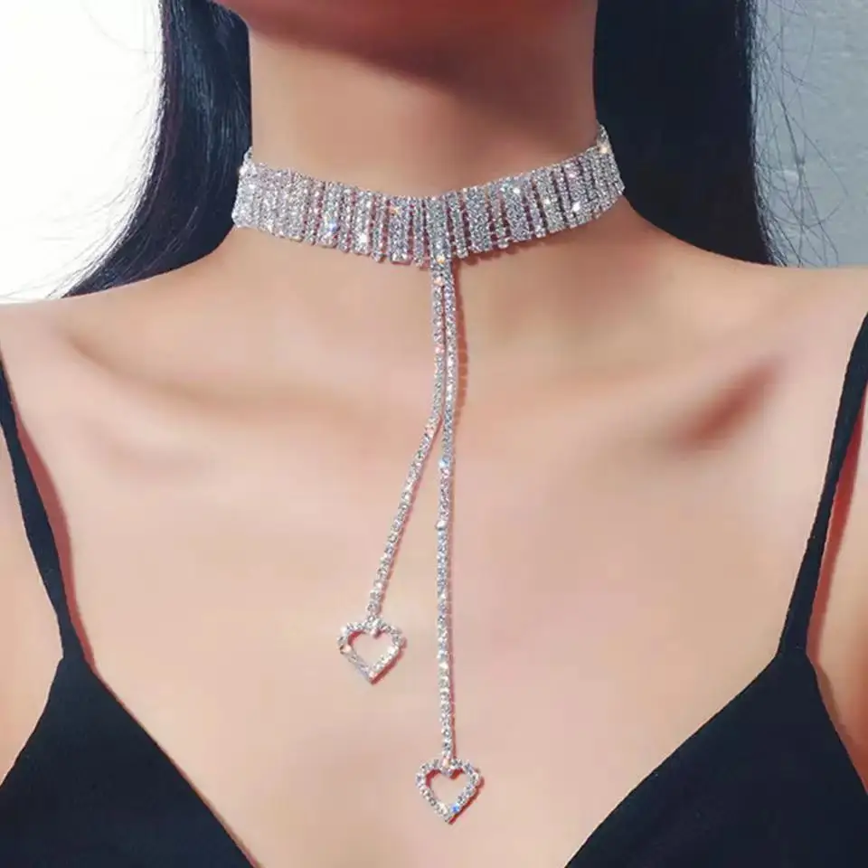 Фото Роскошное женское длинное ожерелье с кулоном в виде маленького сердца фианитами