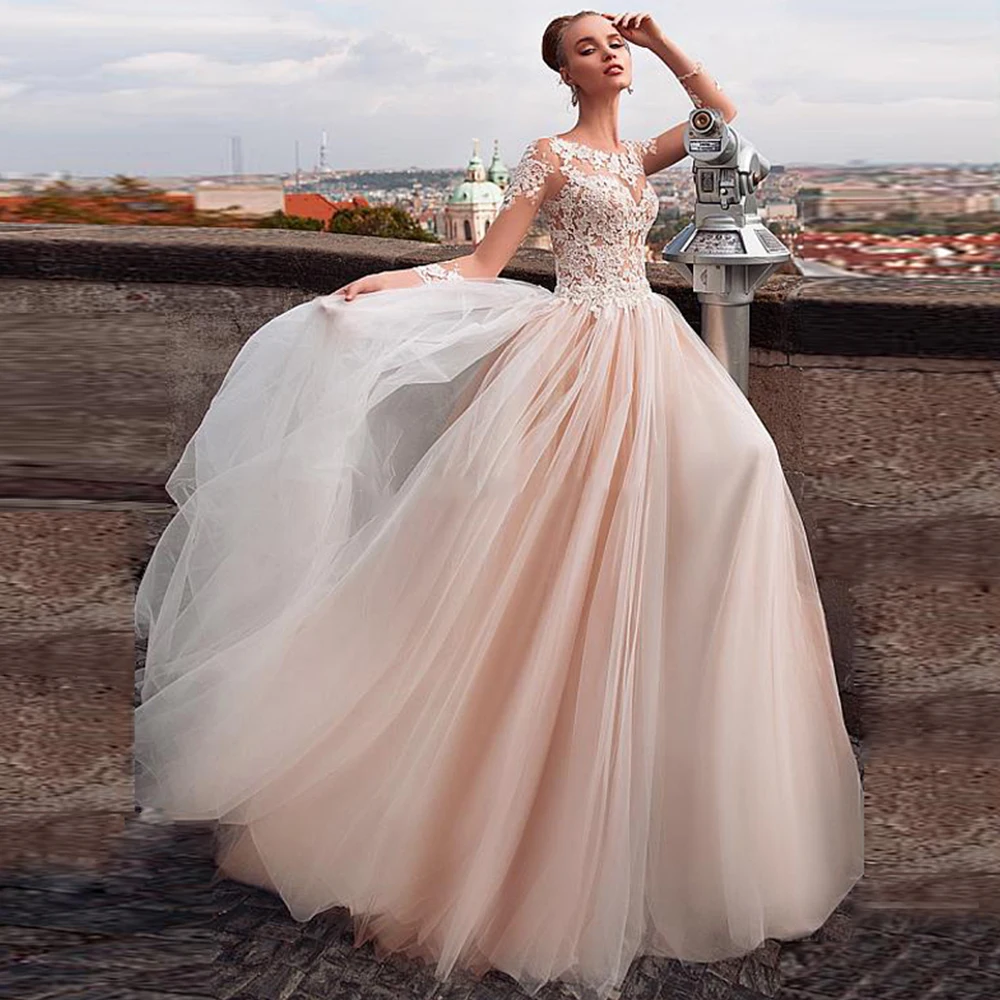 

Champagne A-Line Wedding Dresses Tulle Long Sleeves O-Neck Buttons Back Lace Appliques 2021 Bride Gowns Vestido De Noiva