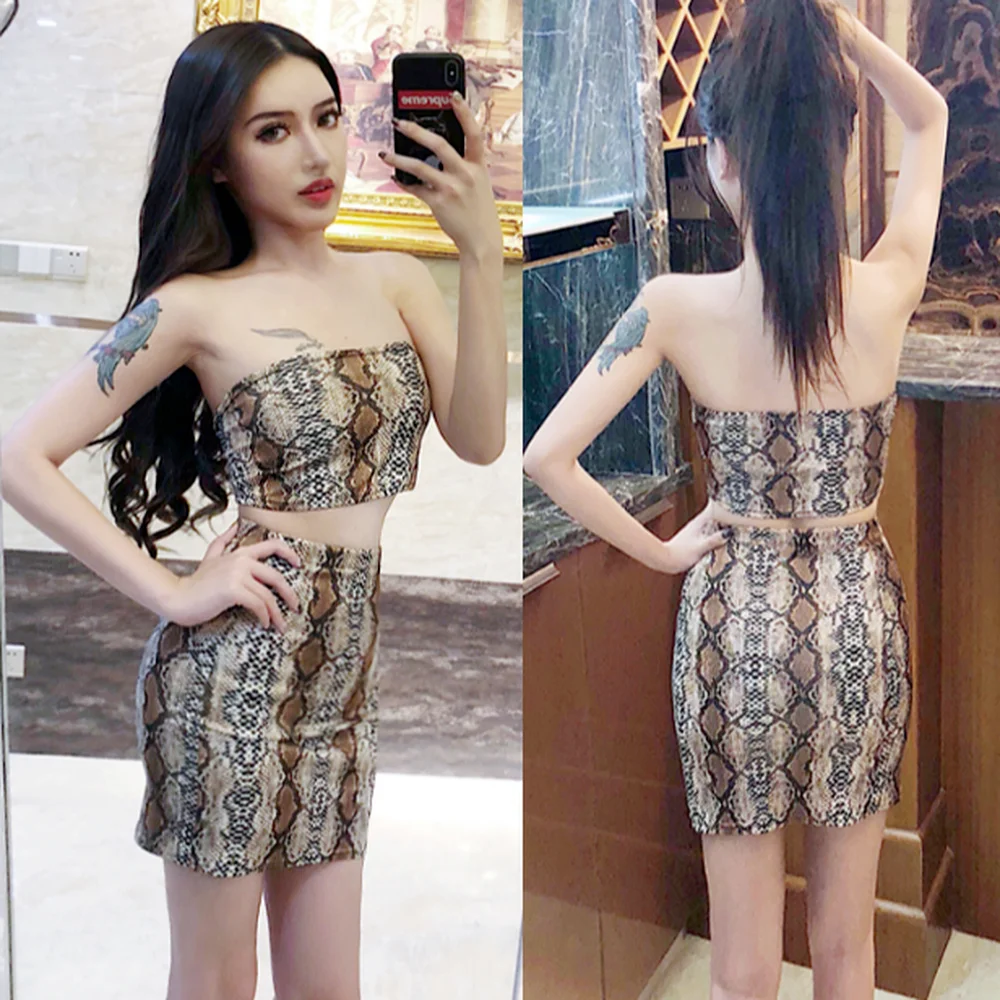 

Summer European and American women sexy & Club low-chested serpentine blouse top and high-waisted Short skirt two-piece set