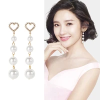 wooqw fashion luxury earrings for women 2020 sexy heart long pearl earrings female 925 sterling silver korean jewelry wholesale