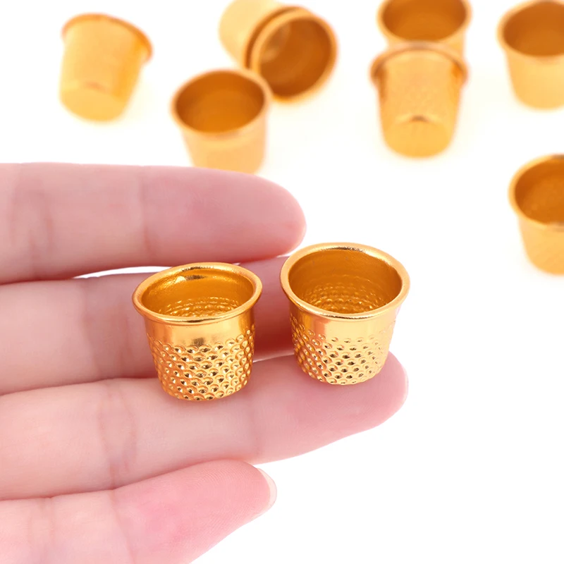 

10pcs/lot Sewing DIY Gold Color Sewing Thimbles Metal Finger Protector Tools Craft Accessories