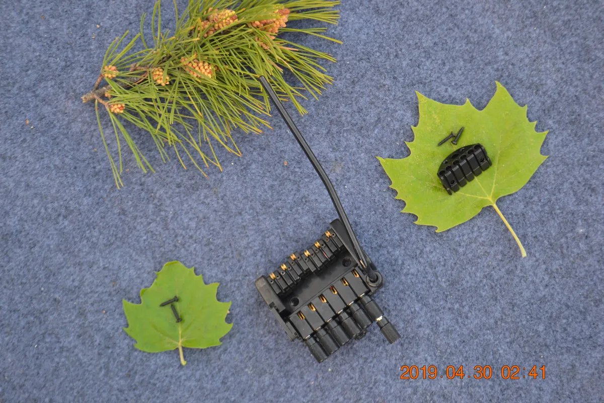 Новая безголовая электрическая гитара с двойным волнообразным мостом в черном