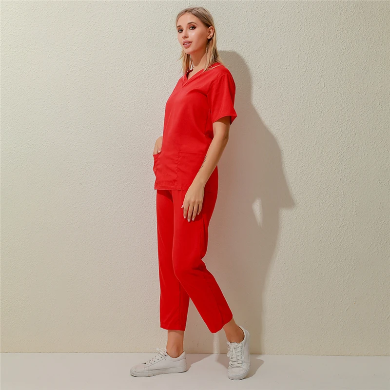 

Ladies Solid Color Suit Two Piece Short Sleeved Tops With Pockets Loose Pants Female Casual Suit High Quality New