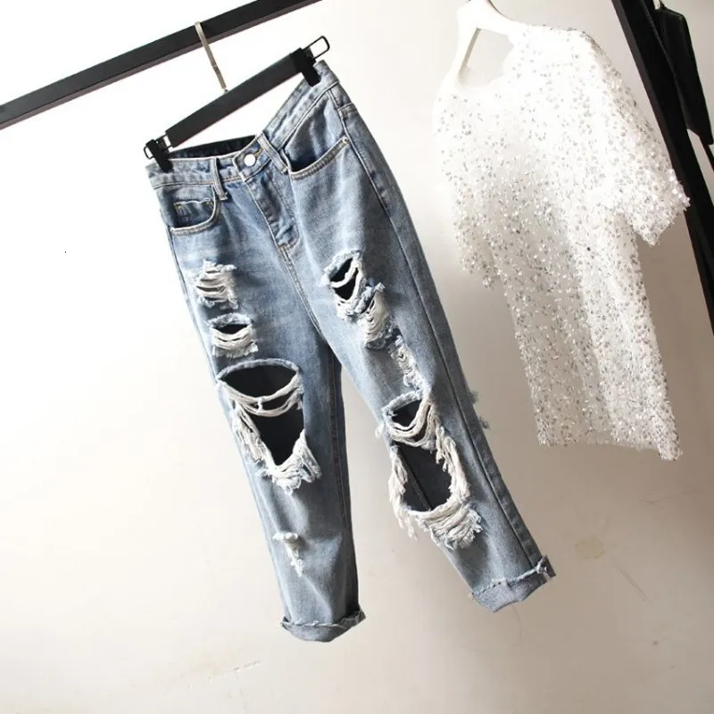 Женские джинсы оверсайз свободные облегающие винтажные шаровары с дырками