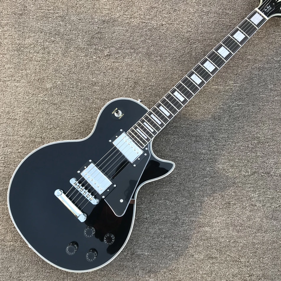 

Black Electric guitar, Rosewood fingerboard, Chrome hardware, Solid mahogany body electric guitar, Free shipping