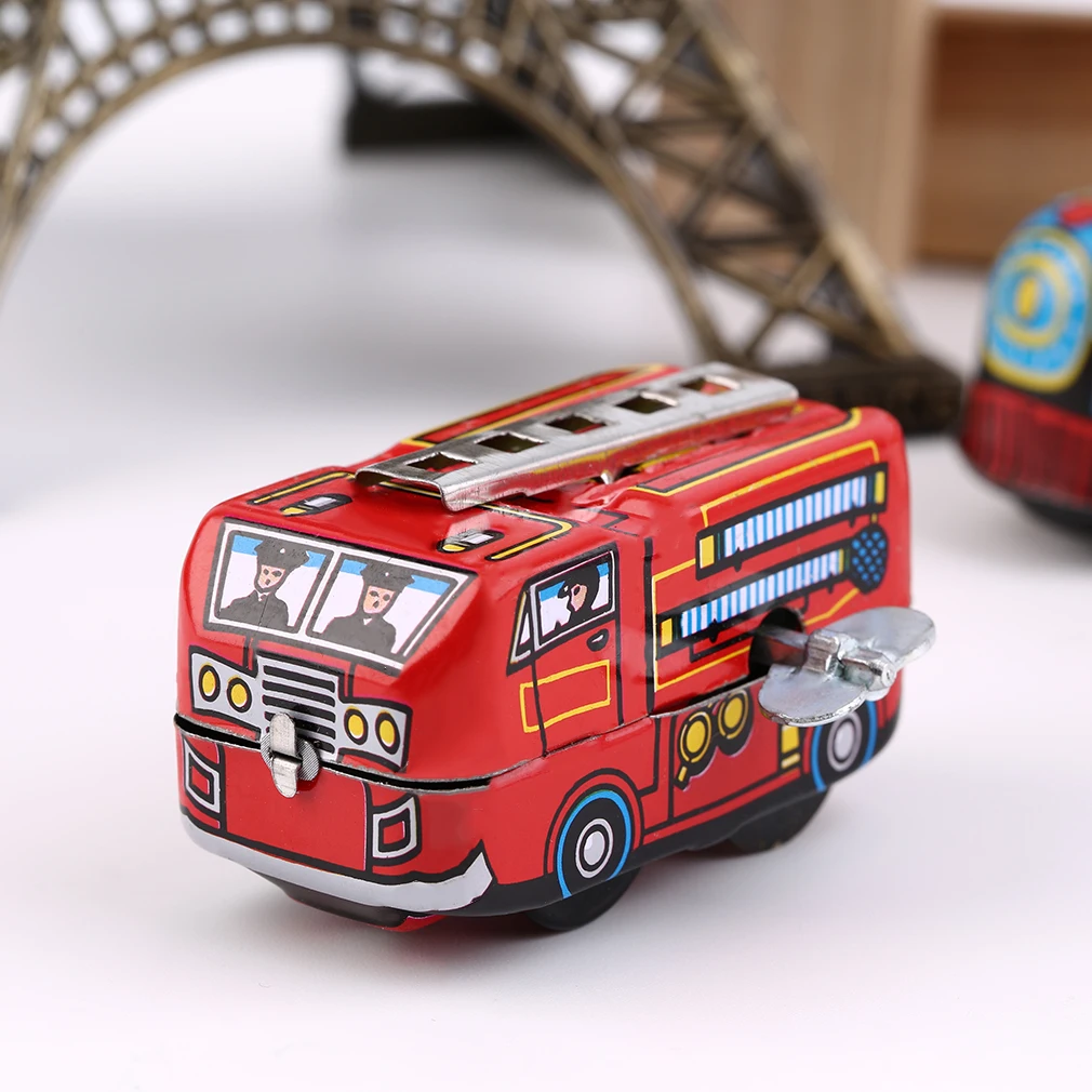 

Retro Classic Firefighter Fire Engine Truck Clockwork Wind Up Tin Toys Worldwide Sale