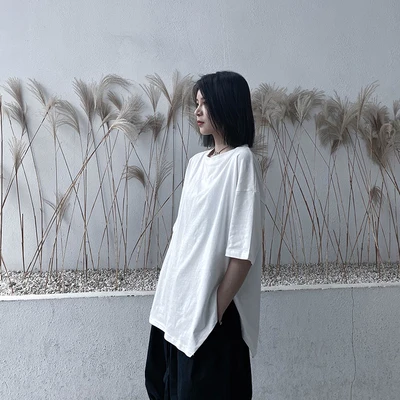 

Short-sleeved t-shirt women's summer 2020 new loose-and-mix solid color personality design sense of irregular half-sleeve Jacket
