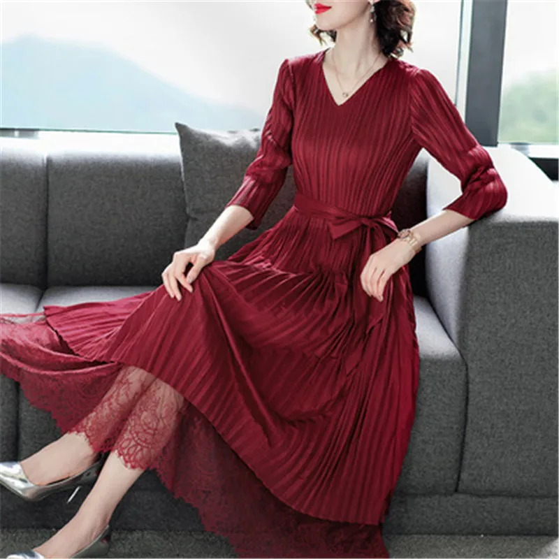 

Women's pleated dress 2021 spring new Miyake folds three-quarter sleeves vertical strips fashion loose large size red dress