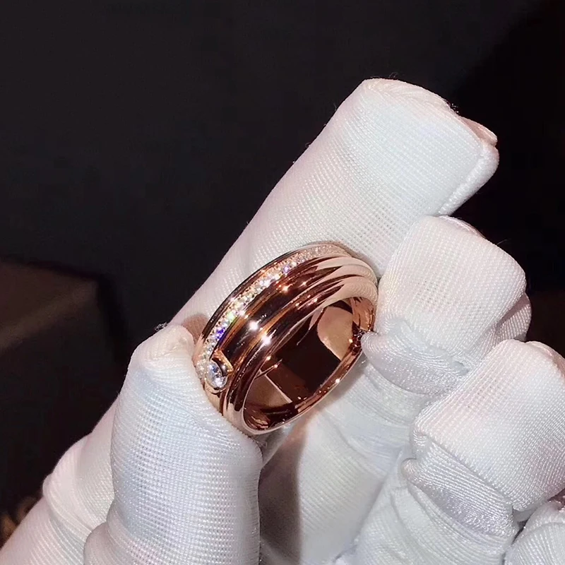 Вращающееся кольцо известного бренда обручальное вращающееся с кубическим