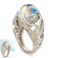 fashion womens hollow swan seven color imitation moonlight stone ring wedding jewelry size 5 10