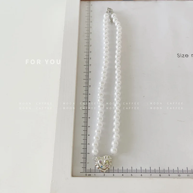 

Sweet and Cool Girl Pearl Necklace Casual Fashion Retro Sweater Chain Clavicle Chain Necklaces