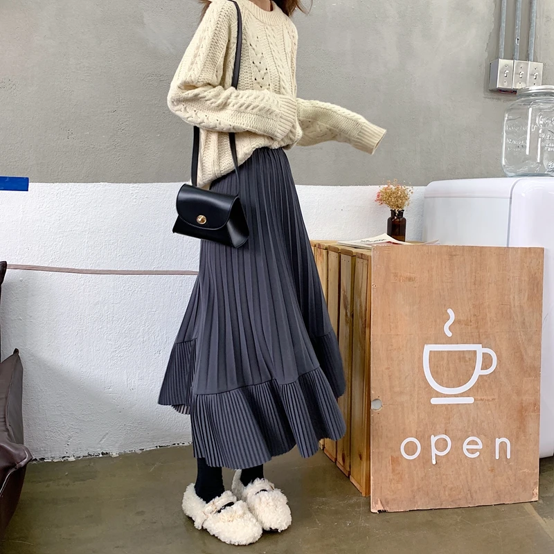 

2021 pring Korean Skirt Women High Waist Asymmetrical Midi Elastic Pleated Skirts Female Casual Fashion Tide
