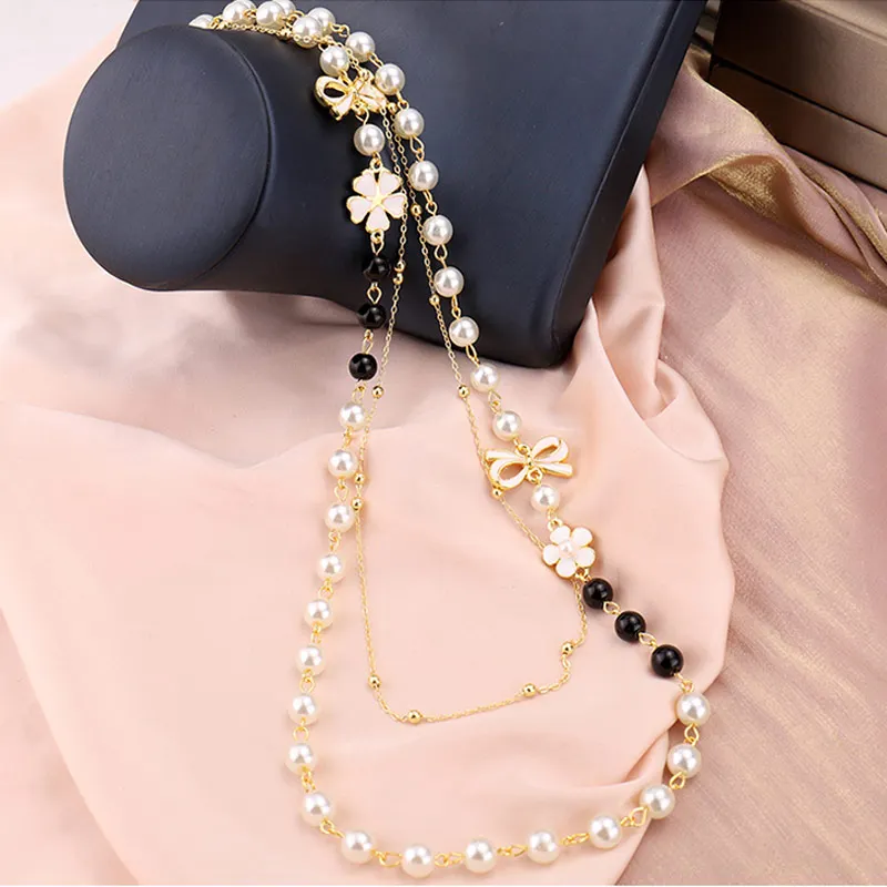 Колье многослойное женское с жемчугом длинное ожерелье камелией и бантом модная