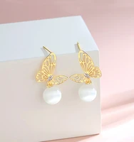 gold hollow butterfly big white pearl pendant earrings fashion elegant modern womens earrings 2022 wedding engagement jewelry