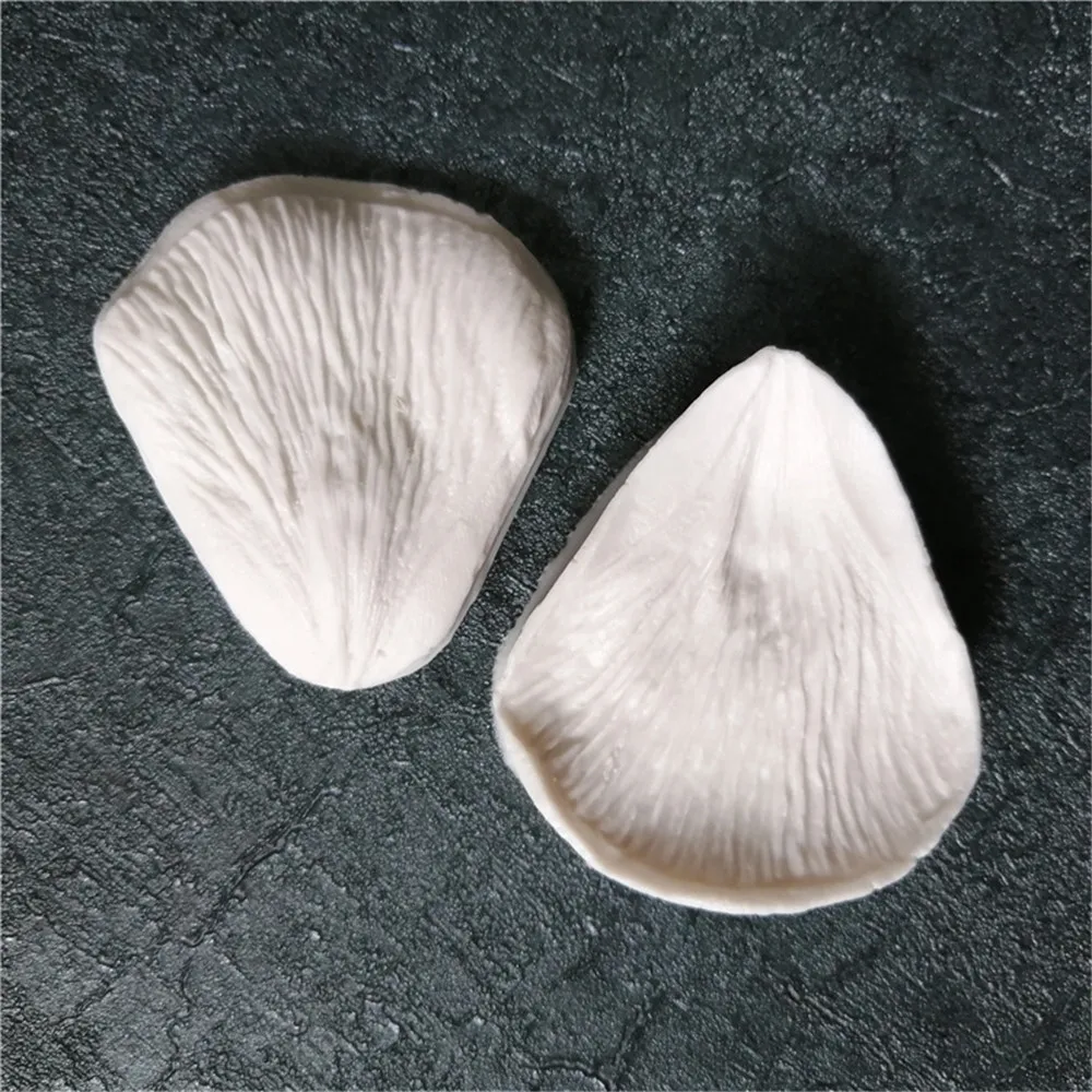 Формы из силиконовой глины имитируют узоры в виде цветов и яиц вены