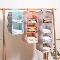 hanging wardrobe storage rack fabric hanging storage rack folded with side pockets for storing items