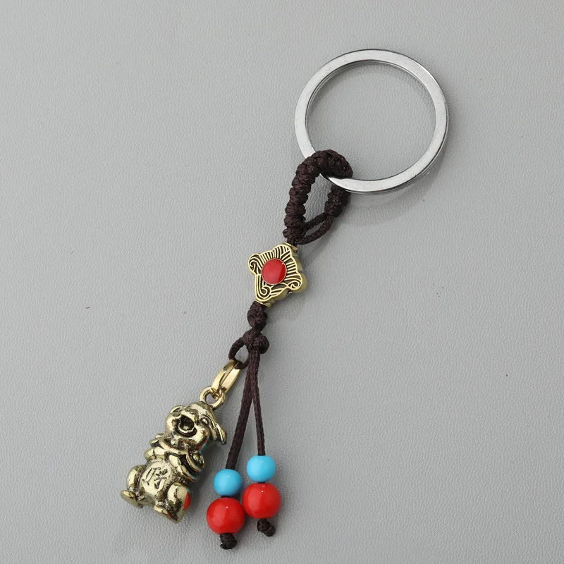 Металлический брелок в виде животных