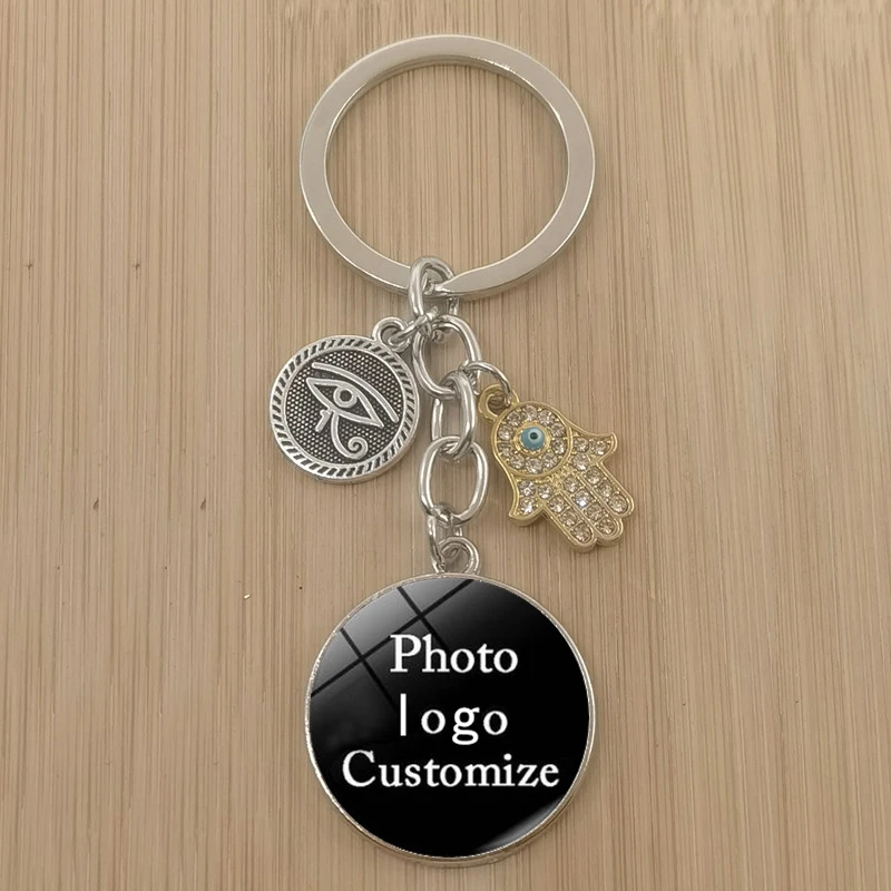 Красивый круглый стеклянный кабошон с изображением синего сглаза для