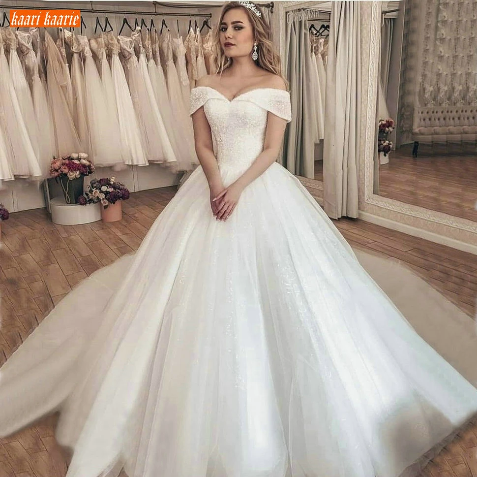 

Romantic Boho White Wedding Gowns Off Shoulder Lace Up Sequin Tulle Ball Gown Wedding Dress Long 2020 Custom Made Bridal Dresses