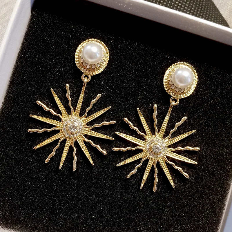 

2021 new European and American exaggerated big sun Earrings temperament retro Pearl Earrings temperament high sense face thin