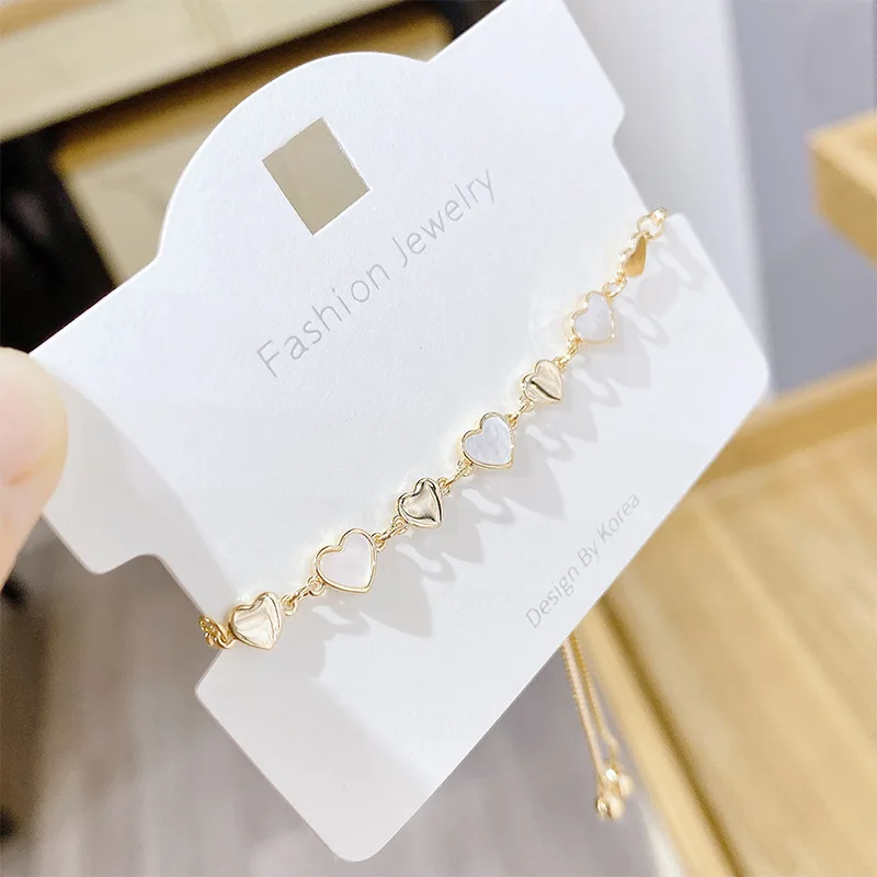 

Wholesale Shell Bracelet Female Korean Peach Heart Adjustable Pull Ornament