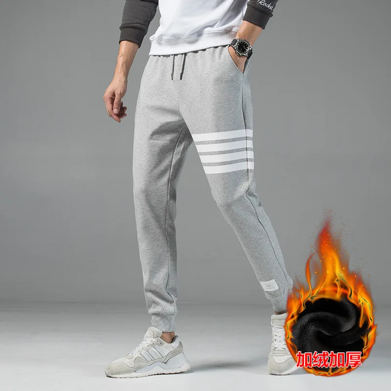 

New Autumn And Winter Plus Velvet Weapon Men And Women Tide Four Bar Casual Sports Pants Men's Feet Footage Couple Trousers