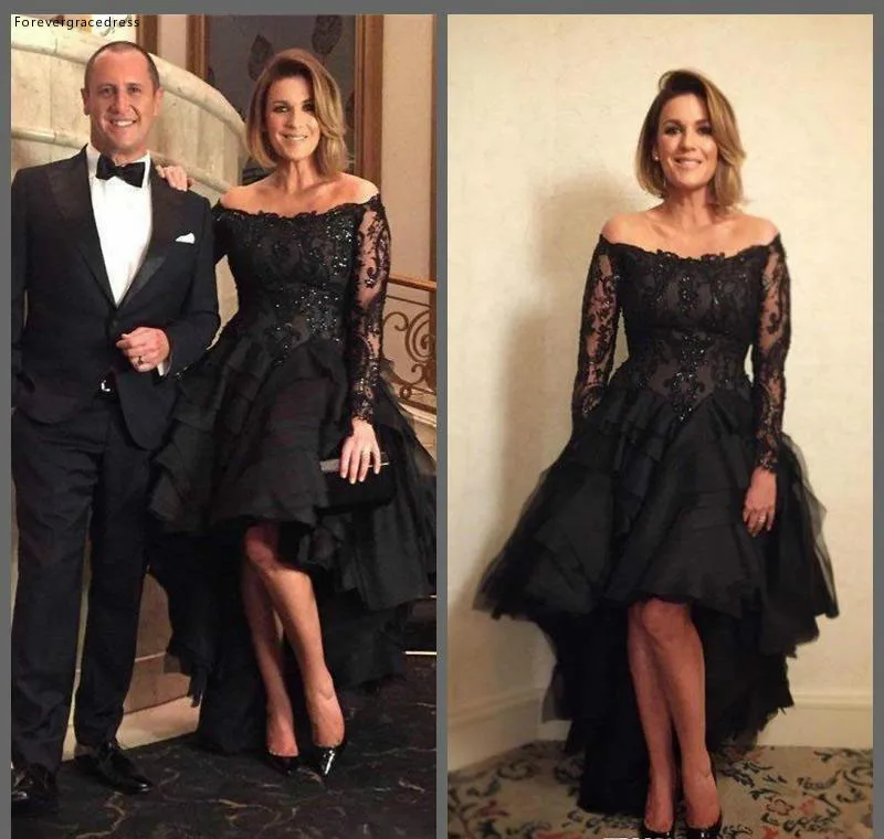 Черное вечернее платье с открытыми плечами и длинными рукавами праздничная