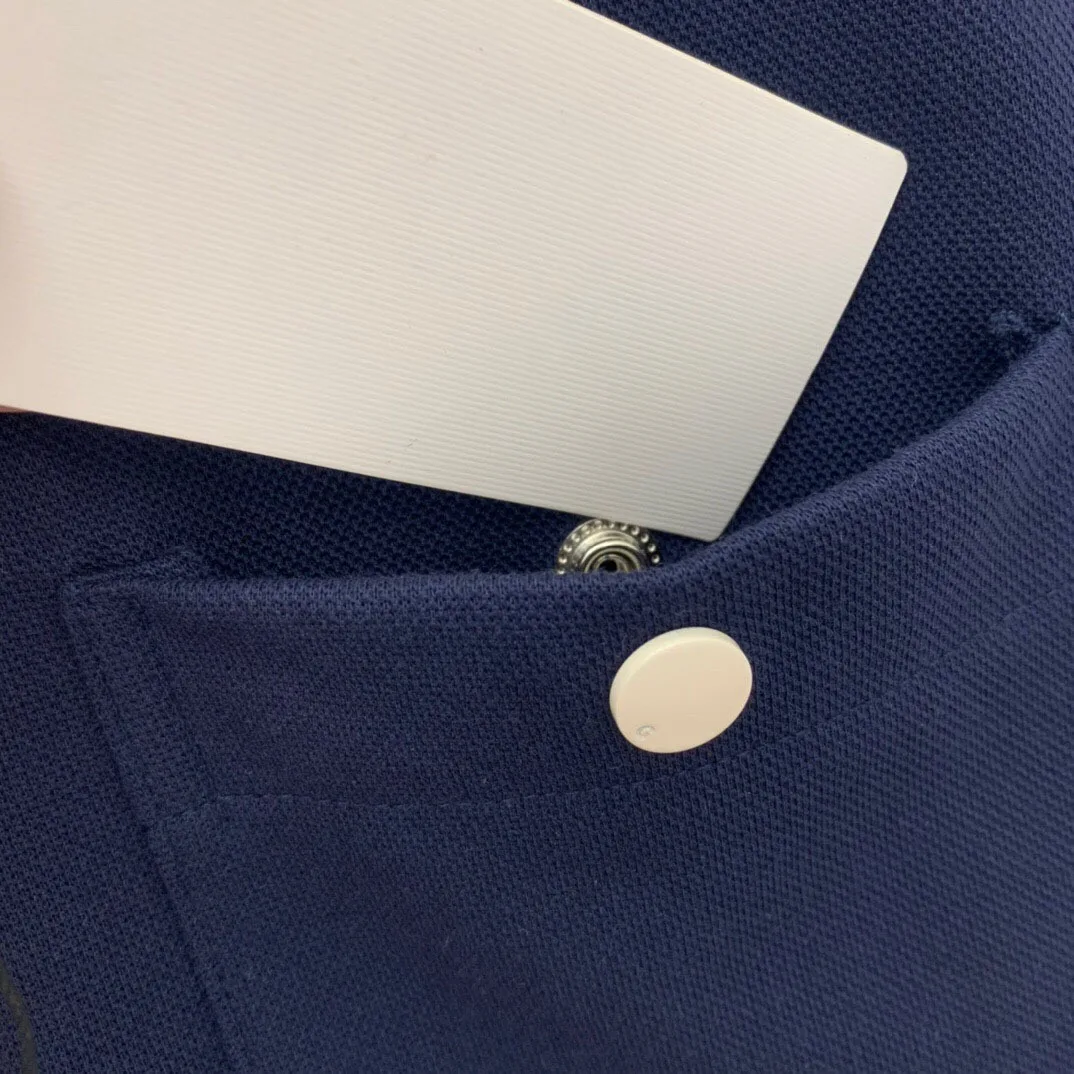 

High Quality Color-blocking Logo on Chest Double Pockets Button-engraved Letters Round Neck Short-sleeved Small A Version Dress