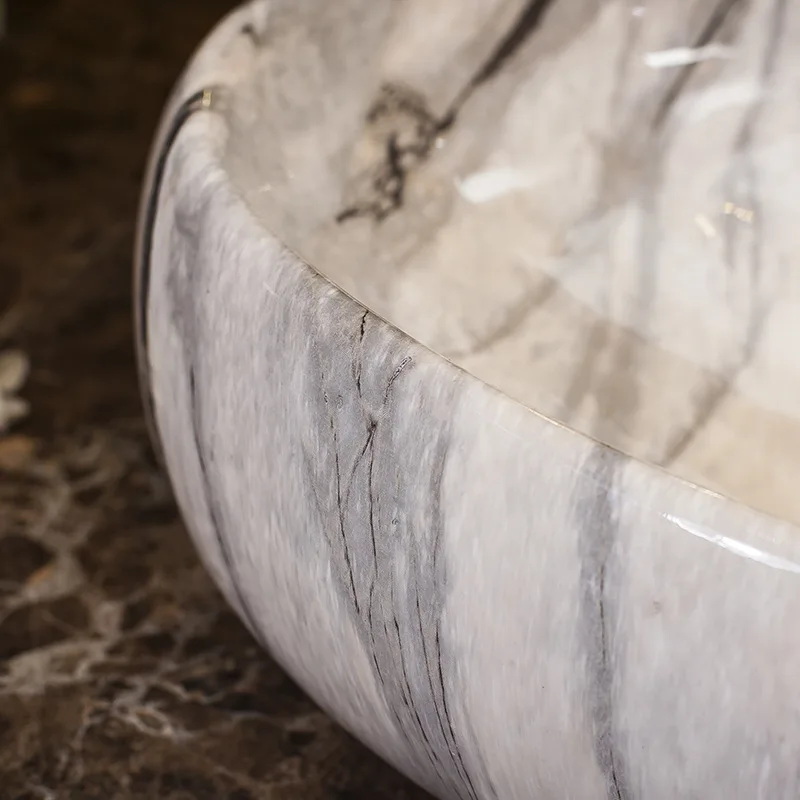 Керамическая раковина над прилавком овальная с Европейским мраморным узором