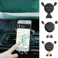 gravity smartphone stand car cell phone holder smile face snap type phones gps stand universal car air vent mount holder
