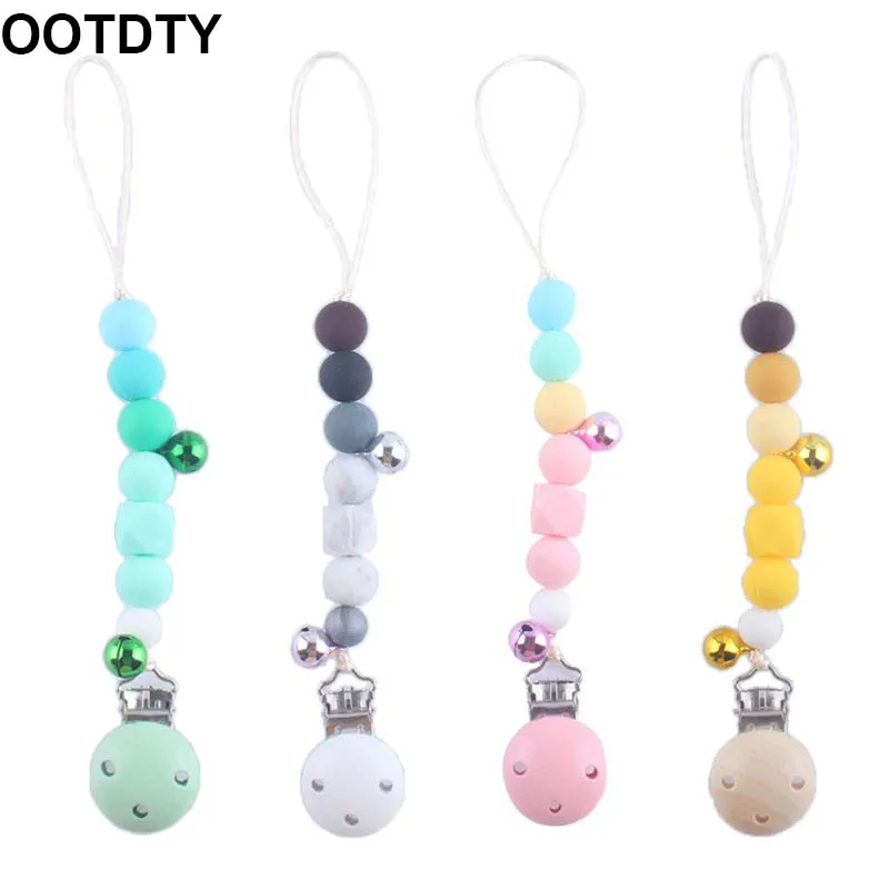 

Baby Pacifier Chain Clip with Bells Silicone Teether Teething Soother Molar Nipple Holder Infant Toy Shower Gifts
