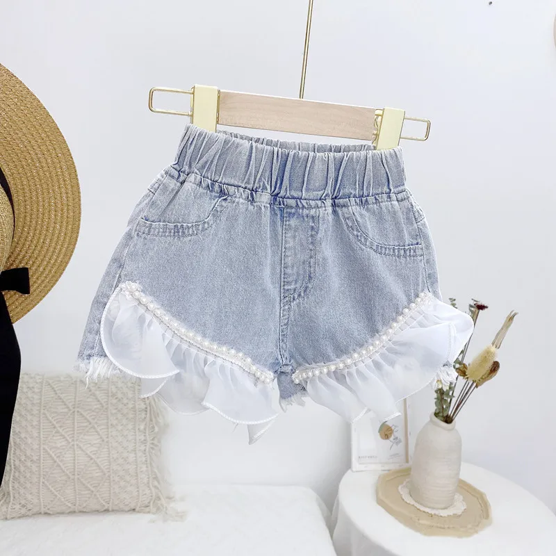

Летние джинсовые шорты для девочек, детские модные штаны, детская одежда, корейские повседневные джинсовые шорты с оборками, элегантные мил...