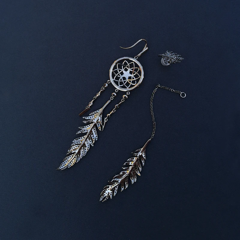 

Morocc silver S925 new asymmetric mysterious black dream catching Earrings women's personality feather long earrings