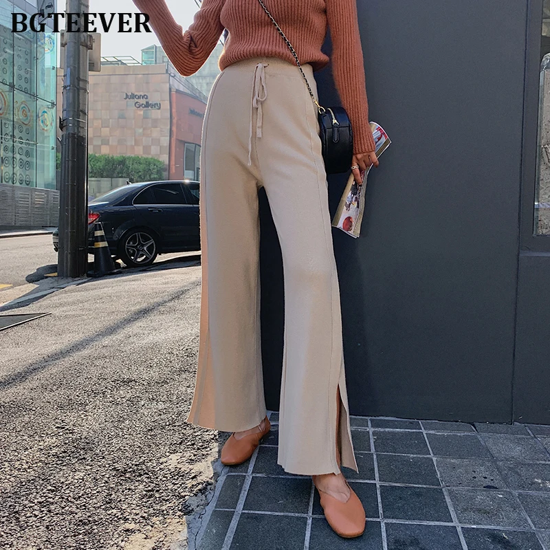 Осенне зимние широкие брюки женские свободные трикотажные на шнурке с высокой