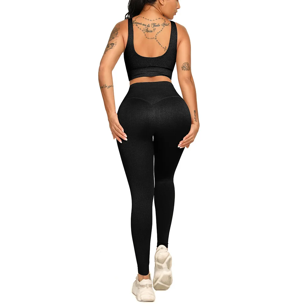 

European American knitted solid color stripes seamless yoga suit women shockproof sports bra set high waist pants fitness suit