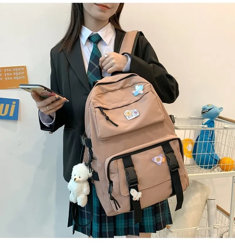 

Large-capacity backpack male multi-pocket middle school junior high school students simple Korean outdoor travel backpack 2022
