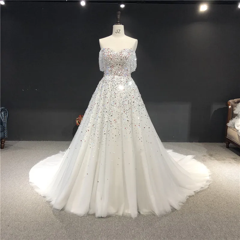 

Высококачественное свадебное платье до пола цвета слоновой кости, расширяющееся книзу, с вырезом лодочкой, блестками и бусинами, с коротким...