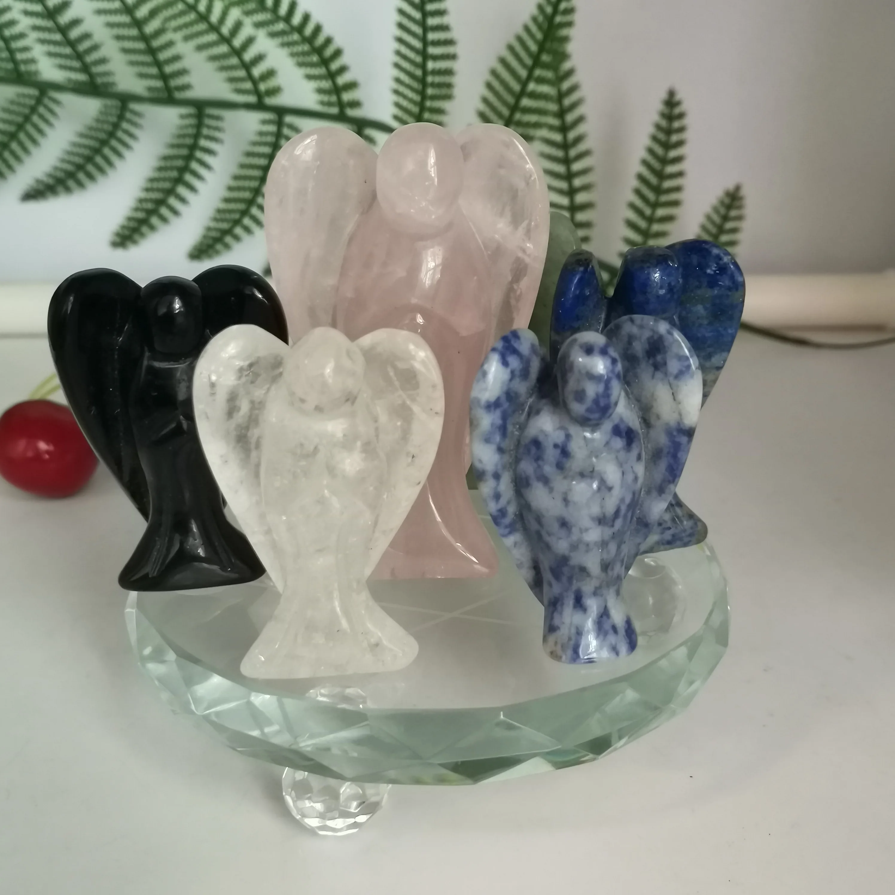 

7pcs natural crystal, beautiful crystal hand carved angel wings to complete the seven-star array