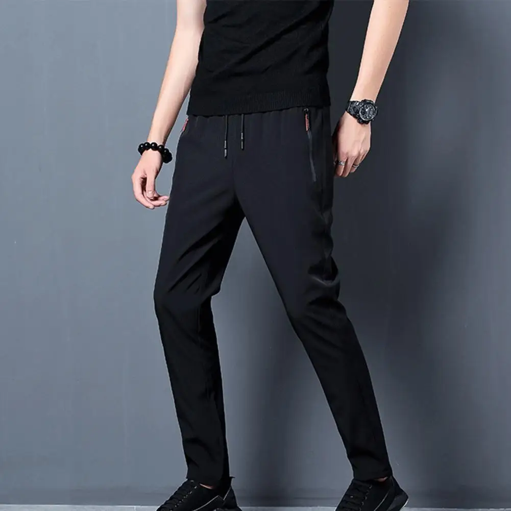 

Брюки мужские летние, быстросохнущие, с завязками на щиколотке, на молнии, с карманами, тонкие, водонепроницаемые, размера плюс